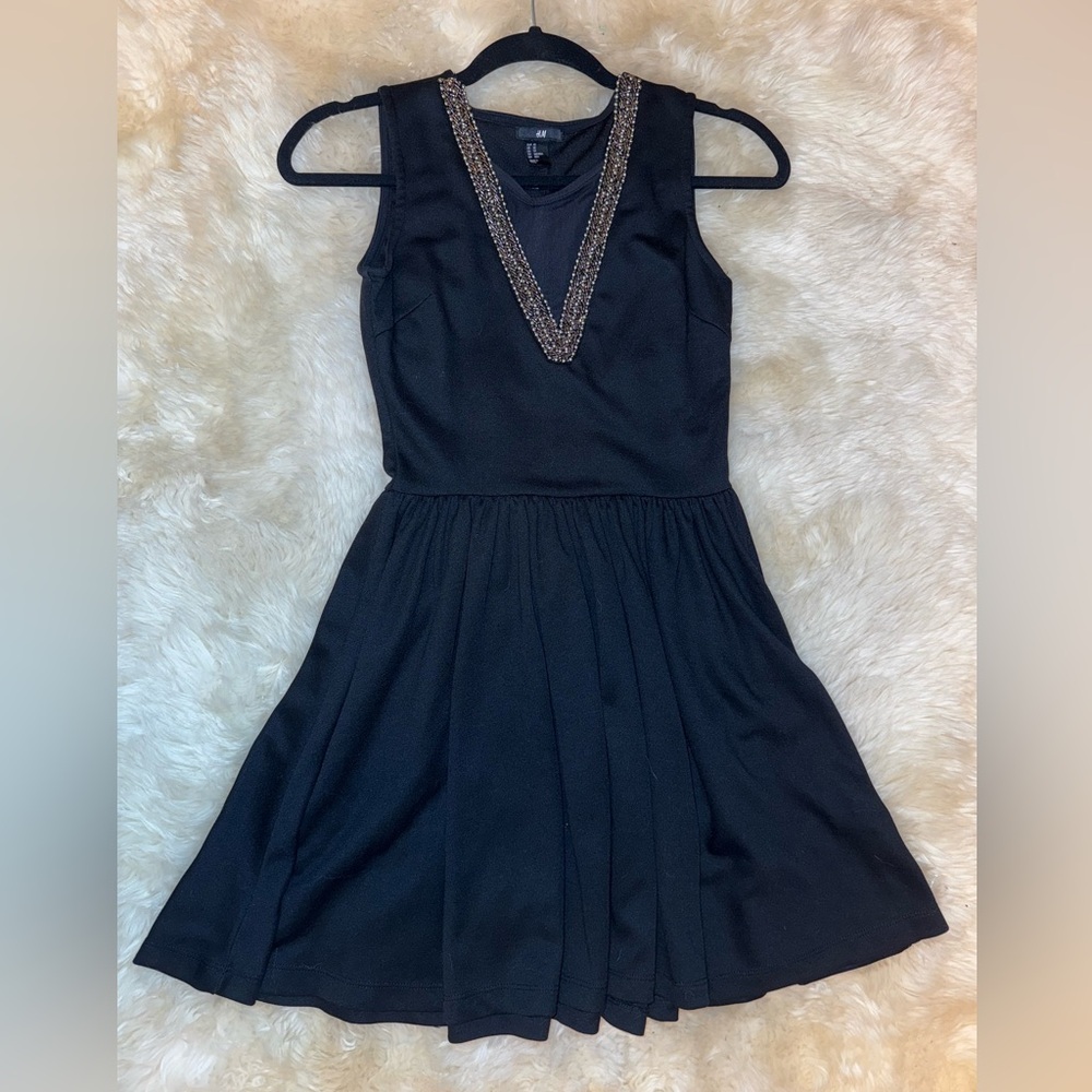 Womens skater dress. Mesh detail with beading
